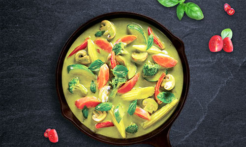 Rich Thai Curry Classic served in a traditional bowl with jasmine rice